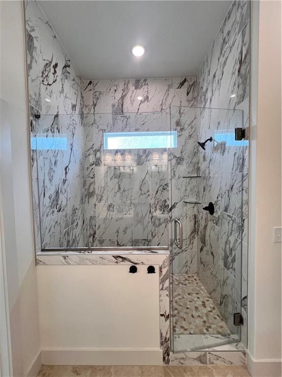 16372 Spring Valley St, Gardner, KS 66030 - full bathroom featuring a marble finish shower, baseboards, and recessed lighting