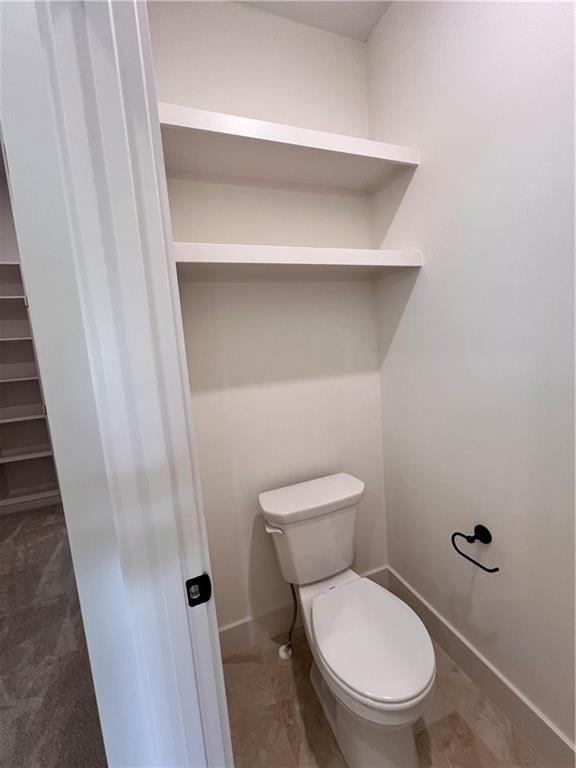 16372 Spring Valley St, Gardner, KS 66030 - bathroom with toilet and baseboards