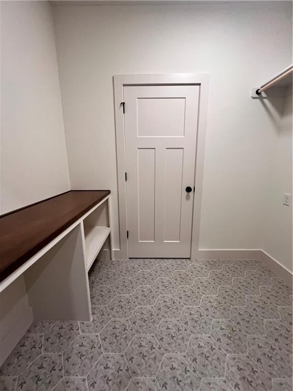 16372 Spring Valley St, Gardner, KS 66030 - laundry room with baseboards