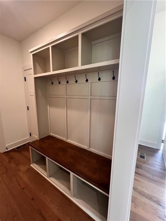 16372 Spring Valley St, Gardner, KS 66030 - mudroom featuring wood finished floors and baseboards
