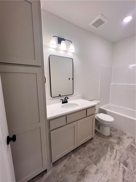 16372 Spring Valley St, Gardner, KS 66030 - full bath with vanity, toilet, and shower / tub combination