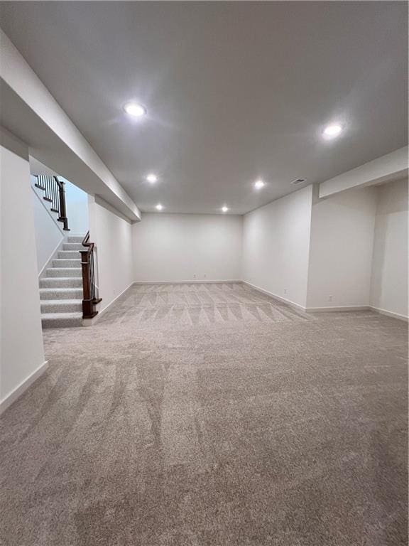 16372 Spring Valley St, Gardner, KS 66030 - finished below grade area with carpet flooring, baseboards, and recessed lighting