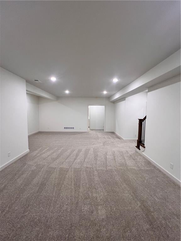 16372 Spring Valley St, Gardner, KS 66030 - finished basement with recessed lighting, light colored carpet, and baseboards