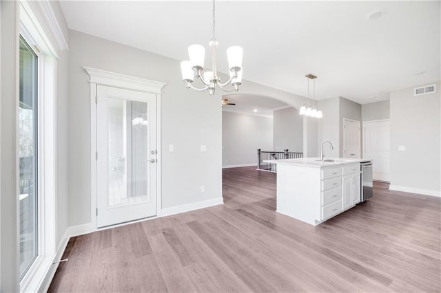 9335 N Belton Ave, Kansas City, MO 64154 - kitchen with an inviting chandelier, dishwasher, a sink, and visible vents