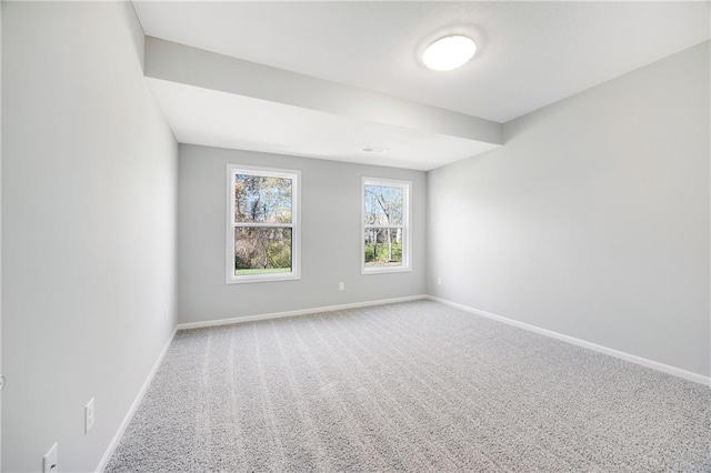 9335 N Belton Ave, Kansas City, MO 64154 - carpeted spare room featuring baseboards