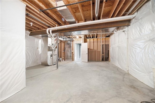 9335 N Belton Ave, Kansas City, MO 64154 - unfinished basement featuring heating unit