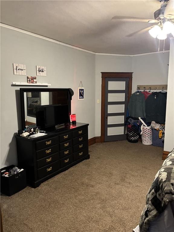 1023 Webster St, Chillicothe, MO 64601 - bedroom featuring carpet floors, ornamental molding, a ceiling fan, and baseboards