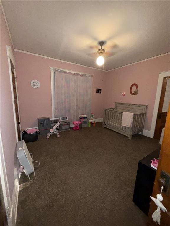 1023 Webster St, Chillicothe, MO 64601 - unfurnished bedroom featuring carpet flooring, crown molding, and a ceiling fan
