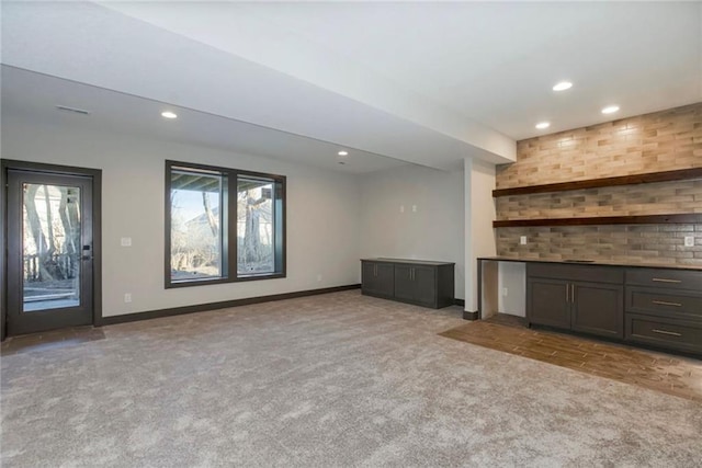 3217 SW Saddlebred Ter, Lees Summit, MO 64082 - unfurnished living room with carpet floors, recessed lighting, and baseboards