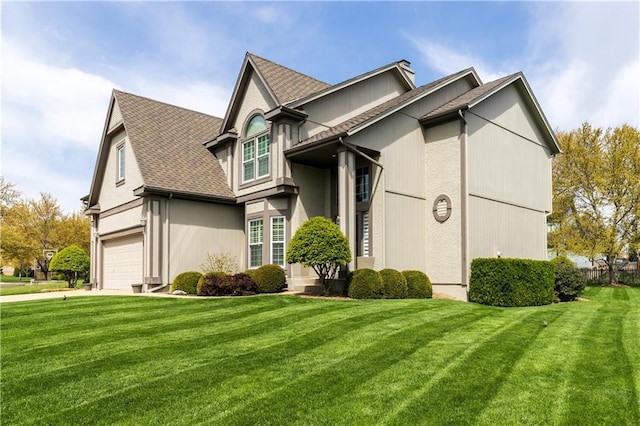 view of property exterior featuring a yard, a shingled roof, and driveway
