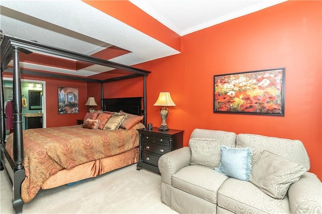 bedroom with crown molding and carpet floors