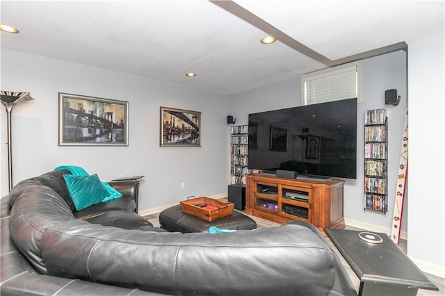 living room with baseboards and recessed lighting