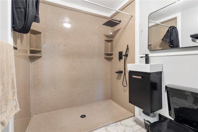 full bath with walk in shower, marble finish floor, and vanity