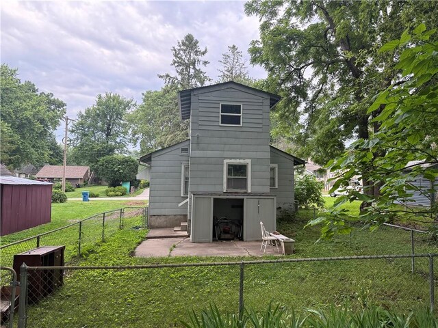 110 W Mechanic Ave, Independence, MO 64050 - back of house with a patio area