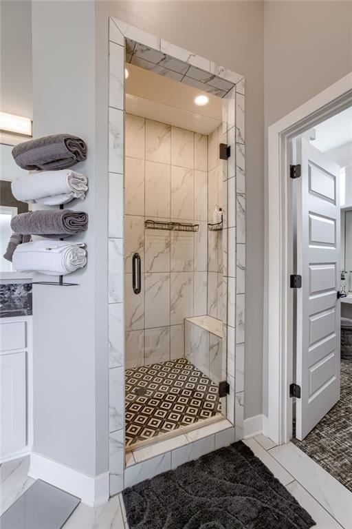 7530 N Gower Ave, Kansas City, MO 64151 - full bath featuring a stall shower, marble finish floor, and baseboards