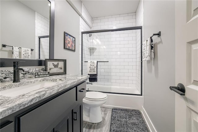 7530 N Gower Ave, Kansas City, MO 64151 - full bathroom with shower / bath combination with glass door, vanity, and toilet