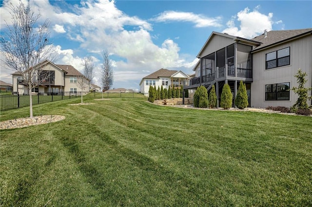 7530 N Gower Ave, Kansas City, MO 64151 - view of yard featuring a fenced backyard and a sunroom