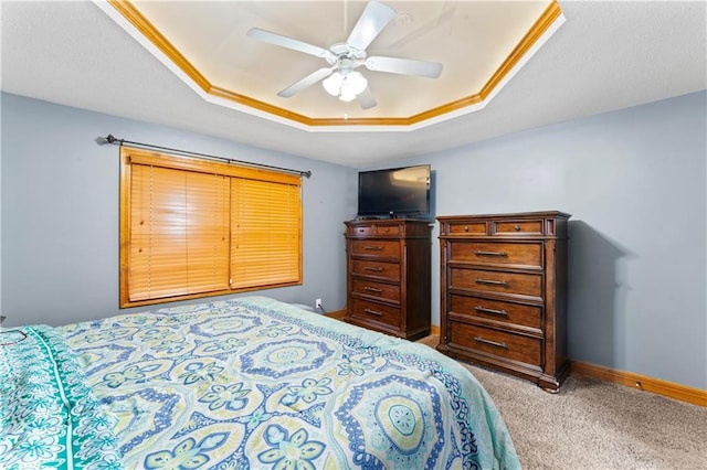 8110 NE 72nd Ter, Kansas City, MO 64158 - bedroom with a raised ceiling, carpet flooring, baseboards, and a ceiling fan