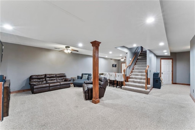 8110 NE 72nd Ter, Kansas City, MO 64158 - living room with baseboards, decorative columns, recessed lighting, stairway, and carpet flooring
