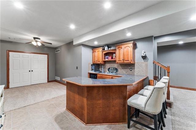 8110 NE 72nd Ter, Kansas City, MO 64158 - kitchen featuring light carpet, recessed lighting, visible vents, and open shelves