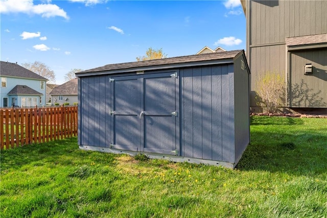 8110 NE 72nd Ter, Kansas City, MO 64158 - view of shed featuring fence