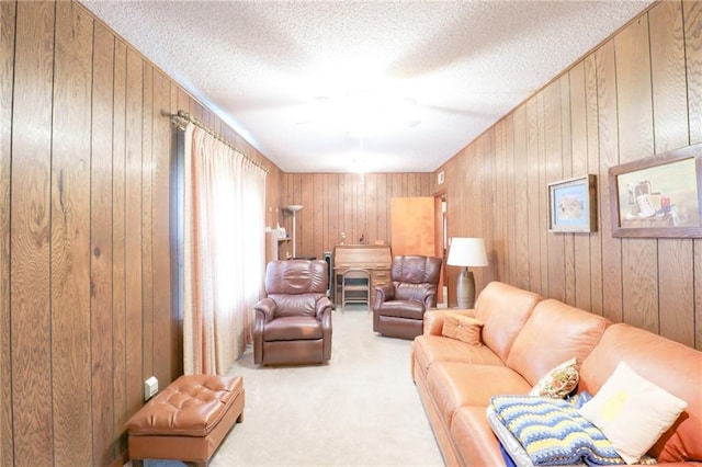 1601 S Market St, Holden, MO 64040 - carpeted living area featuring a textured ceiling and wood walls