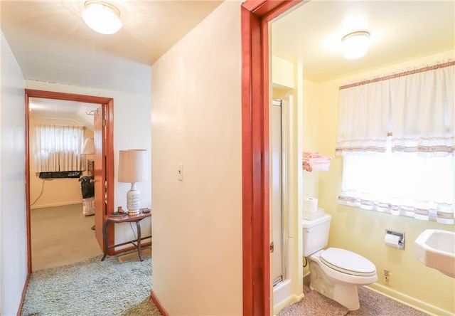 1601 S Market St, Holden, MO 64040 - full bath featuring toilet, baseboards, and a shower stall