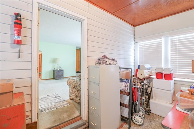 1601 S Market St, Holden, MO 64040 - interior space featuring a healthy amount of sunlight and wood walls