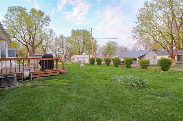 1601 S Market St, Holden, MO 64040 - view of yard featuring a deck and cooling unit
