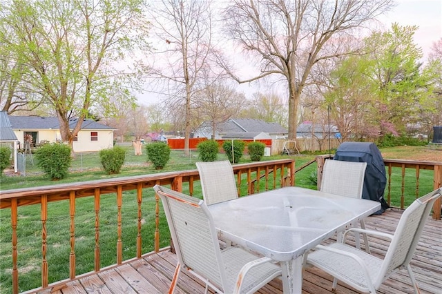 1601 S Market St, Holden, MO 64040 - wooden deck with a yard, a fenced backyard, and outdoor dining area