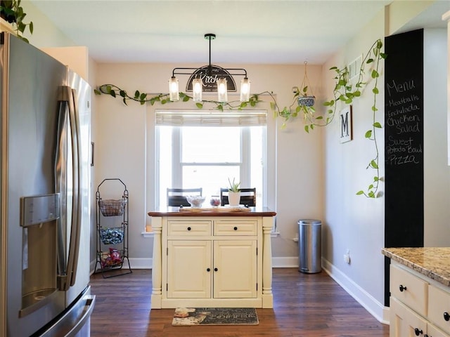 kitchen featuring a chandelier, baseboards, dark wood-style floors, and stainless steel fridge with ice dispenser