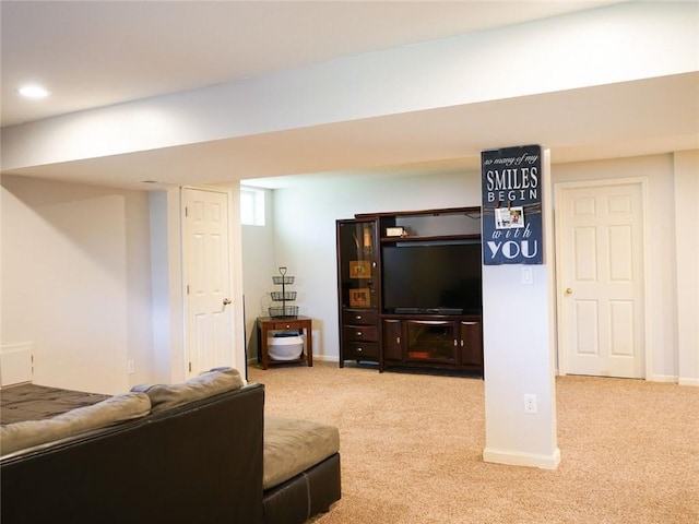 living room featuring baseboards, carpet, and recessed lighting