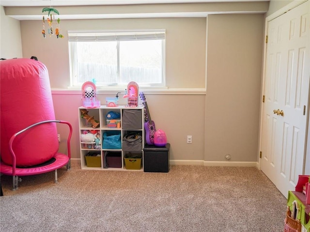 game room featuring baseboards and carpet floors