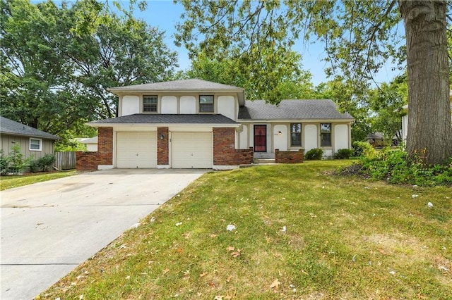 split level home featuring concrete driveway, brick siding, a front yard, and a garage