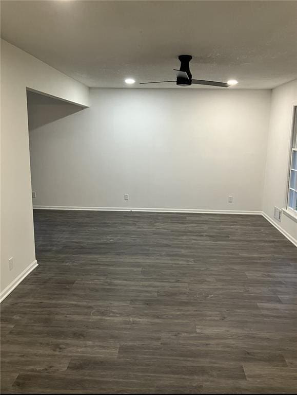 interior space with dark wood-style flooring, recessed lighting, baseboards, and a ceiling fan