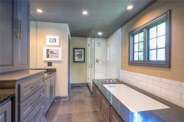 full bath featuring vanity, tile patterned floors, a stall shower, and recessed lighting