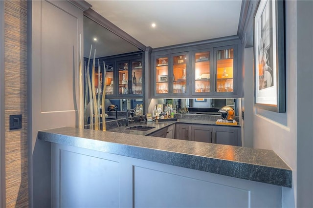 bar with recessed lighting and a sink