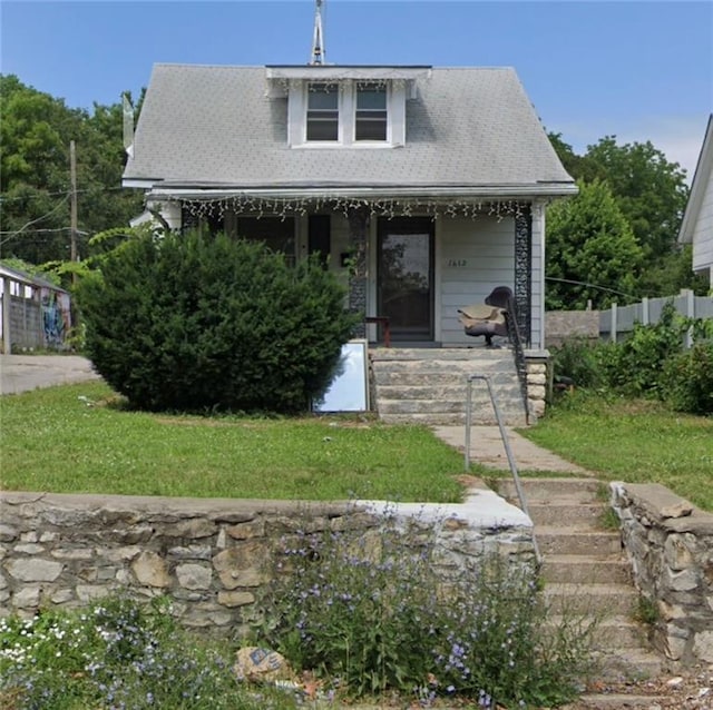 1612 Topping Ave, Kansas City, MO 64126 - view of front of house with covered porch