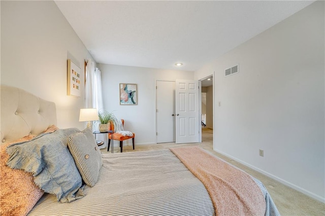 bedroom with light carpet, baseboards, and visible vents