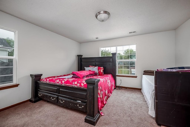 1210 Barnett Ave, Kansas City, KS 66102 - carpeted bedroom with baseboards