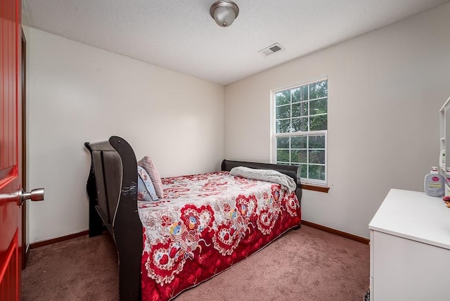 1210 Barnett Ave, Kansas City, KS 66102 - carpeted bedroom featuring baseboards
