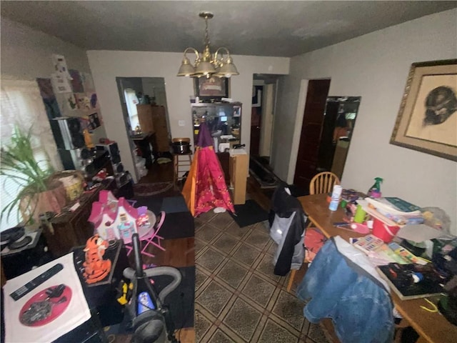 8733 E Saint John Ave, Kansas City, MO 64053 - dining room featuring a chandelier