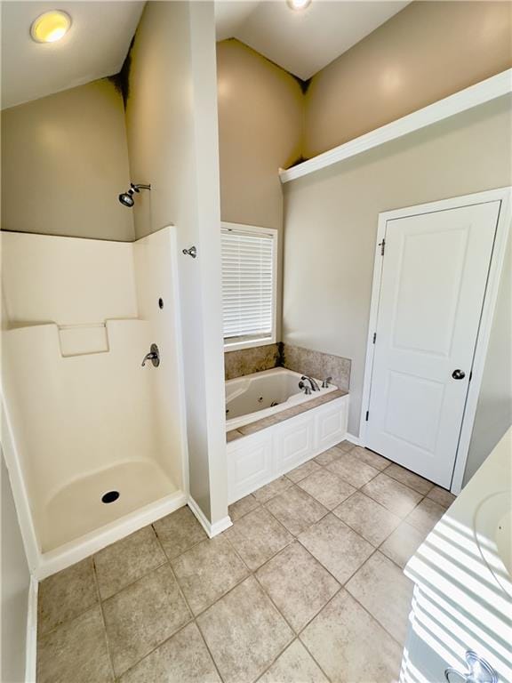 109 Deerfield Dr, Warrensburg, MO 64093 - full bath featuring a jetted tub, a shower, and tile patterned flooring