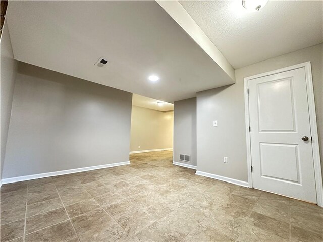109 Deerfield Dr, Warrensburg, MO 64093 - unfurnished room with visible vents and baseboards
