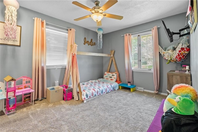 bedroom with carpet and ceiling fan
