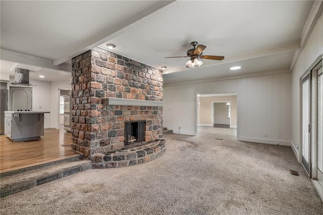 12500 Overbrook Rd, Leawood, KS 66209 - unfurnished living room with carpet floors, a ceiling fan, a brick fireplace, baseboards, and crown molding