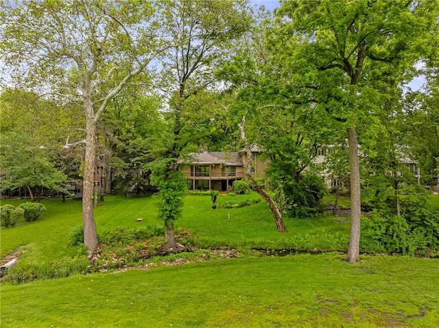 12500 Overbrook Rd, Leawood, KS 66209 - view of grassy yard featuring a wooden deck