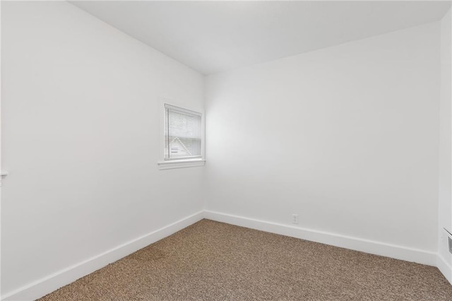 805 N 18th St, Kansas City, KS 66102 - carpeted spare room featuring baseboards