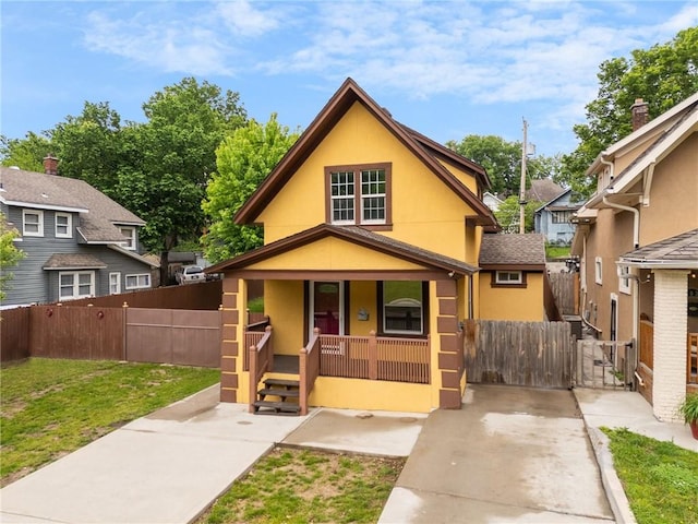 805 N 18th St, Kansas City, KS 66102 - view of front of home with covered porch and stucco siding
