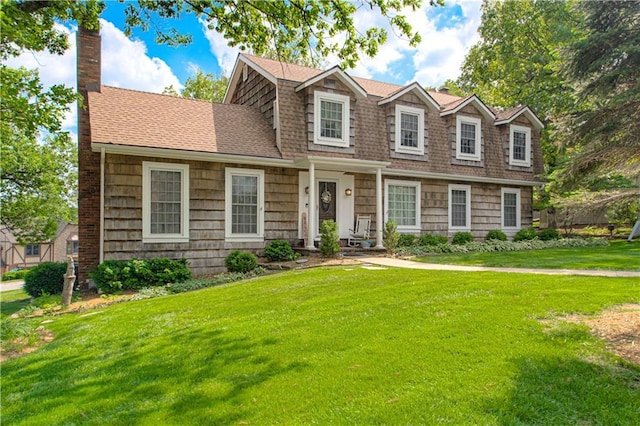 13605 W 48th St, Shawnee, KS 66216 - view of front of house featuring a shingled roof, a front lawn, and a chimney